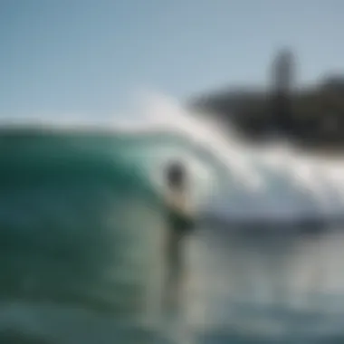 Surfer catching a wave at Tamarack Surf Beach