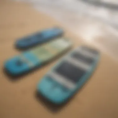 A selection of various boogie boards displayed on a sandy beach