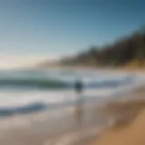 Stunning coastal view of La Jolla Shores with surfers riding the waves.