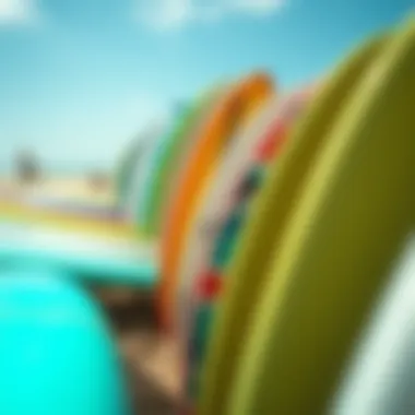 A Palette of Surfboard Designs A close-up of surfboards lined up on the beach, showcasing vibrant colors and designs