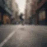 A skateboarder performing a no comply trick on an urban street.