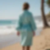 A stylish surfing towel robe displayed on a beach setting