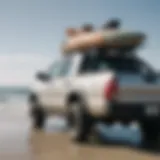 Toyota Tacoma with surfboard rack at beach