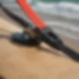 Detailed view of a longboard leash attached to a surfboard