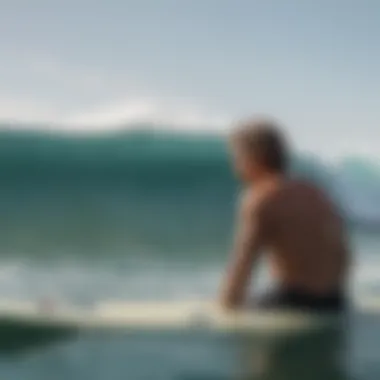 A surfer contemplating the ocean, looking thoughtful