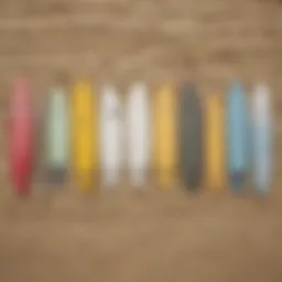 Types of starter surfboards displayed on a sandy beach