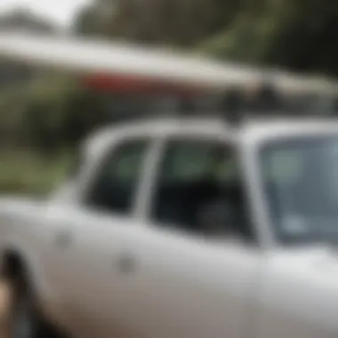 An individual demonstrating proper installation of surfboard roof rack straps