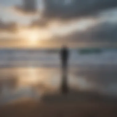 A person standing at the shoreline, gazing at the vast ocean, reflecting anxiety and contemplation.