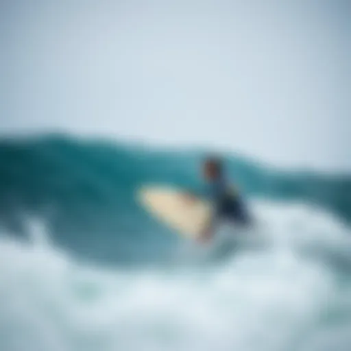 A surfer observing the waves and wind