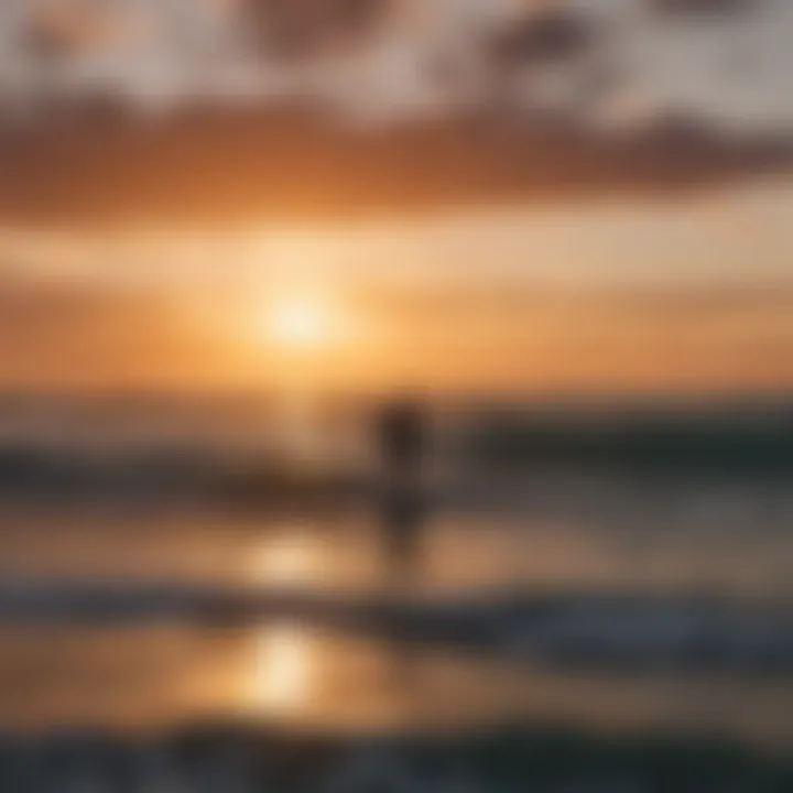 A vibrant sunset over the ocean with surfers silhouetted against the sky