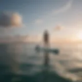 A wide stand up paddle board gliding across a calm ocean surface